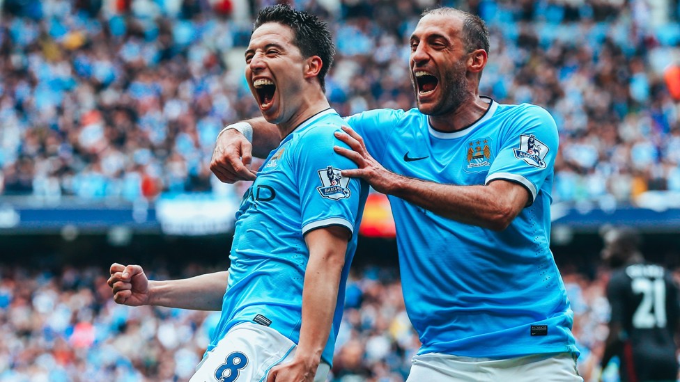 NICE ONE NASRI : Samir Nasri settles the nerves with an opening goal against West Ham in a final day victory over the Hammers - a result which wins us the 2013/14 Premier League crown