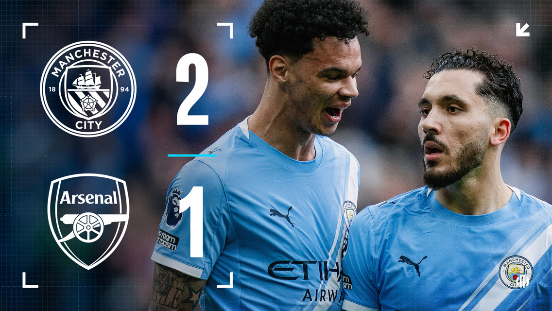 Graphic showing Manchester City defeated Arsenal 2-1. Includes club logos of Manchester City and Arsenal, and two players in Manchester City jerseys.