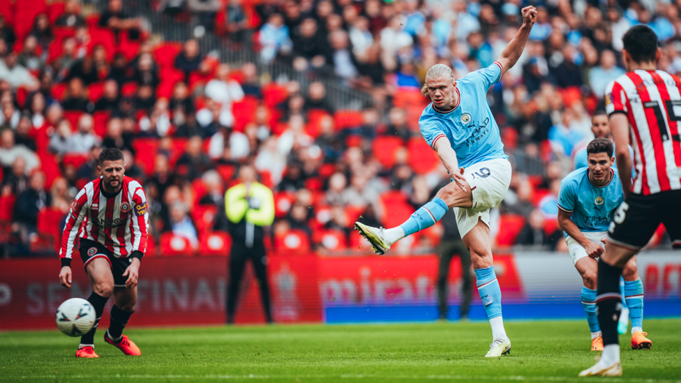 ALMOST : Erling Haaland fires the ball into the back of the net but the referee had already blown his whistle for a foul against City. 