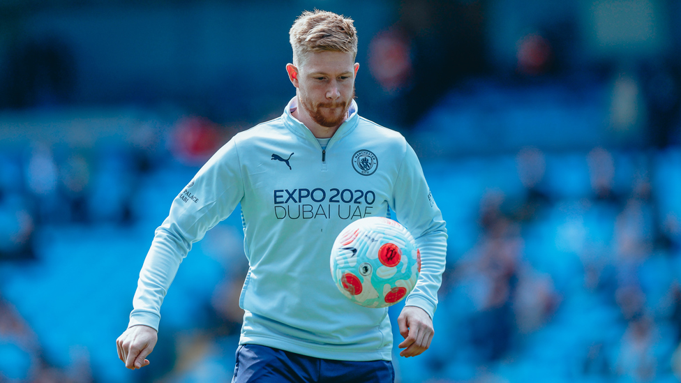 KING KEV : De Bruyne gets a feel of the ball during the pre-match warmup.