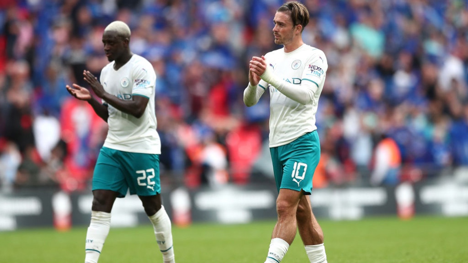 ALL OVER: Grealish and Mendy show their appreciation to the fans at Wembley.