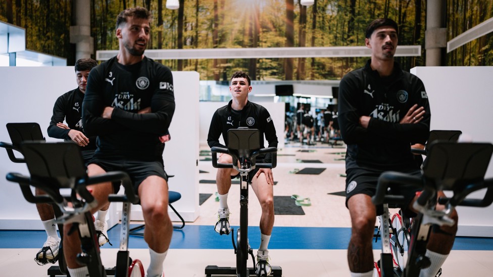 PEDALLING ALONG : Phil Foden and his team-mates get some time on bikes. 
