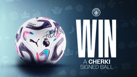Promotional image featuring a signed football with the Premier League logo and PUMA branding, offering a chance to win a Cherki signed ball, affiliated with Manchester City.