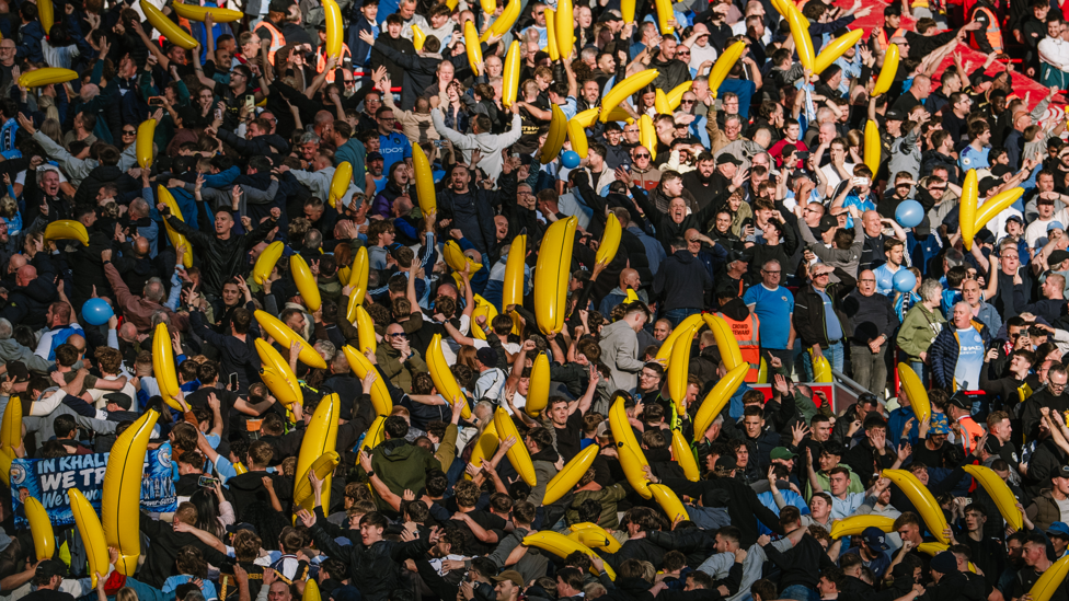 GOING BANANAS : Our away fans loving every second.