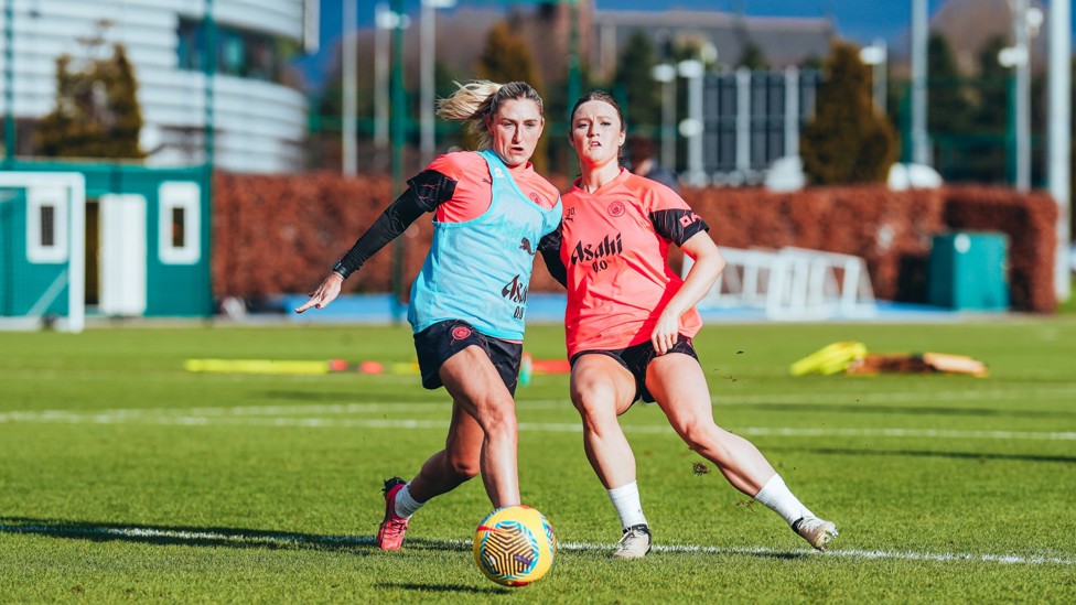 SHOULDER TO SHOULDER : Laura Coombs and Ruby Mace challenge for the ball