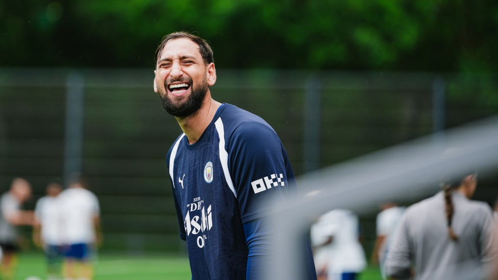CHUCKLING : Gianluigi Donnarumma making the most of the session
