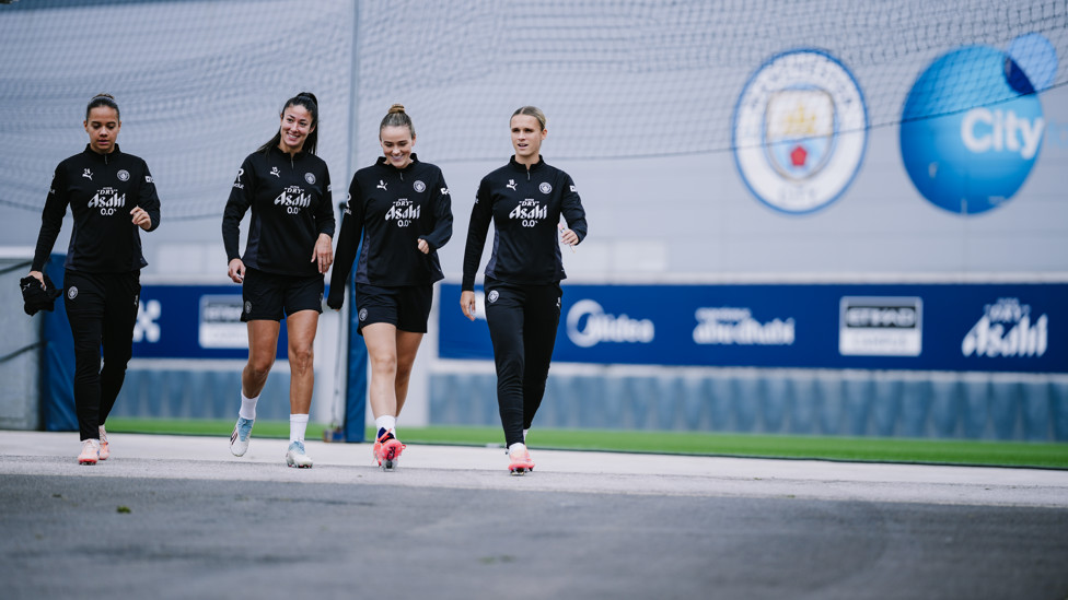 READY TO GO  : Iman Beney, Leila Ouahabi, Grace Clinton and Kerstin Casparij make their way onto the field. 