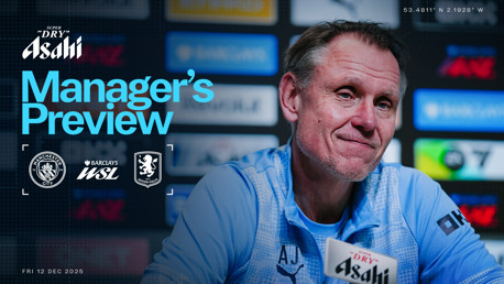 Blurred image of a manager in a press conference promoting the Manager's Preview for the Manchester City vs Aston Villa WSL match scheduled on Friday 12th December 2025. The event is sponsored by Asahi.