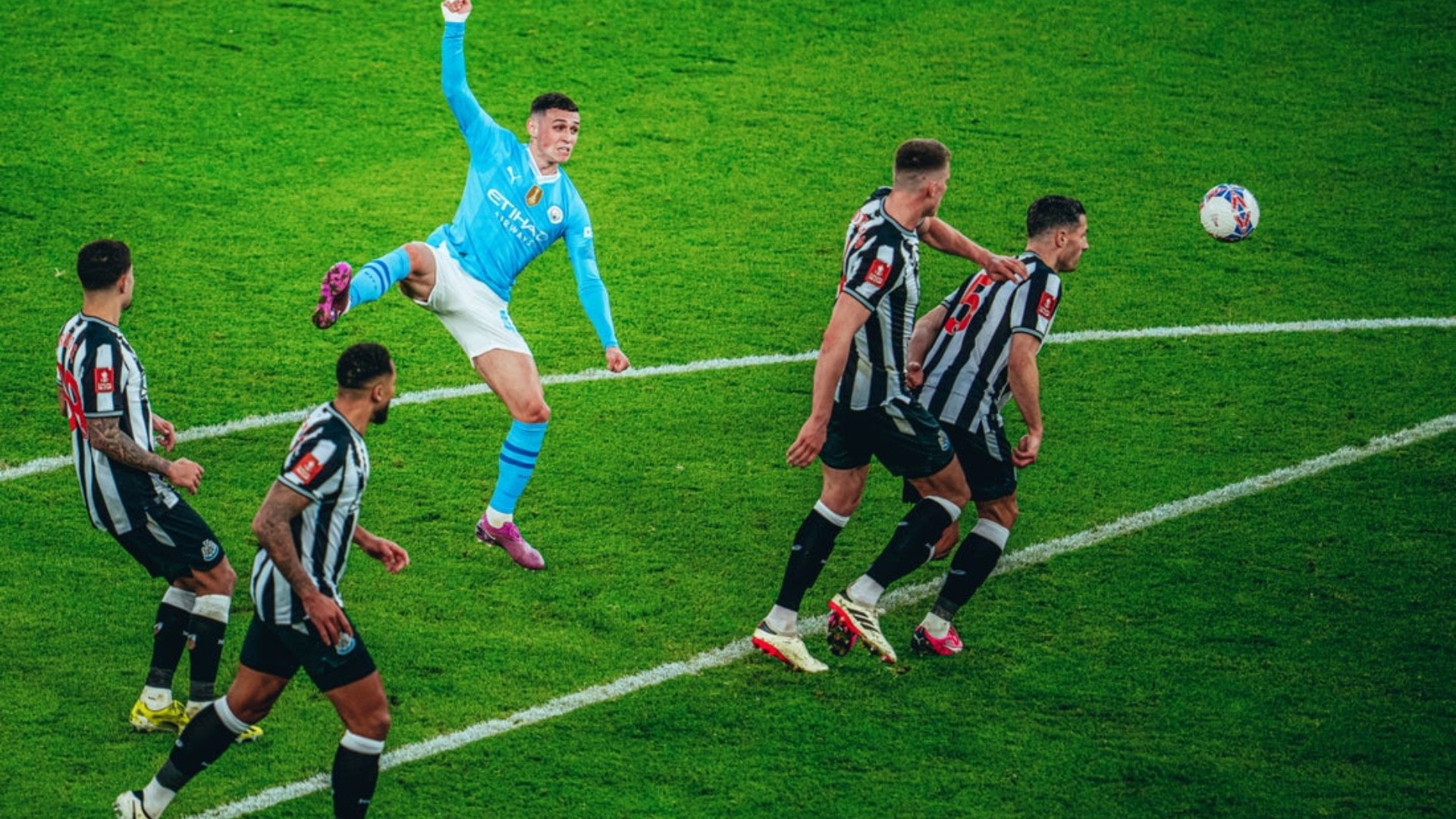 TAKE THAT: Phil Foden tries his luck from outside the box.