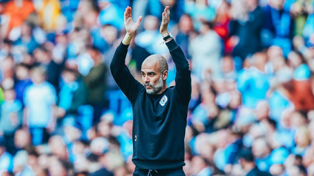 APPLAUD: The boss enjoying his side's display.