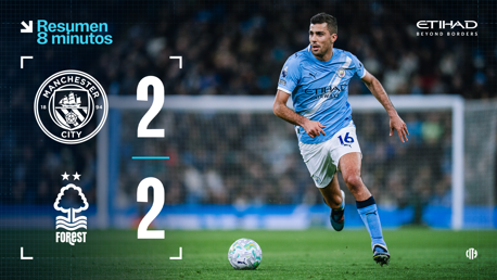 Scoreboard showing a 2-2 draw between Manchester City and Nottingham Forest, with a Manchester City player running with the ball.