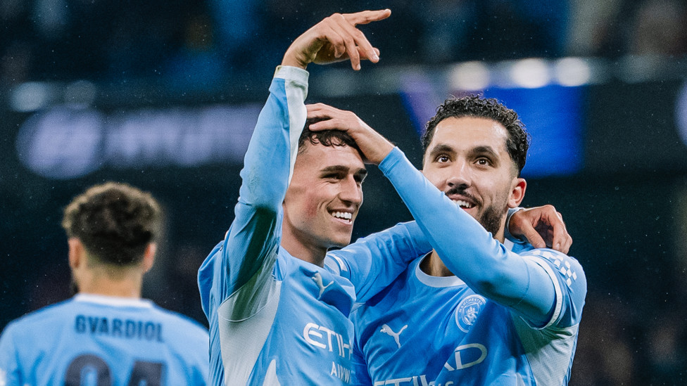 THREE CHEERS: Foden celebrates with Rayan Cherki after the Frenchman's superb effort.