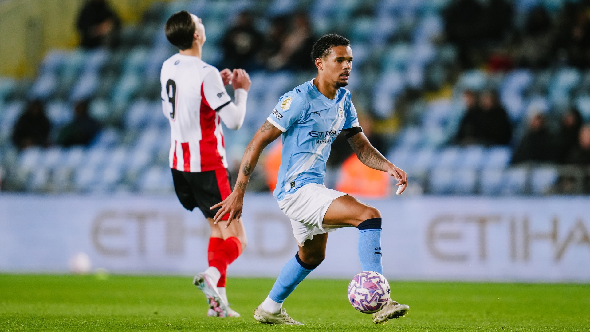 DEFENSIVE DUTIES : Jadel Katongo wins possession.