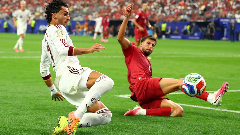  : Portugal's Ruben Dias blocks a shot from World Cup final goalscorer Ferran Torres
