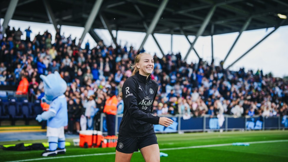 HAPPY TO BE BACK  : Codie Thomas smiles as she walks out at the Joie Stadium.