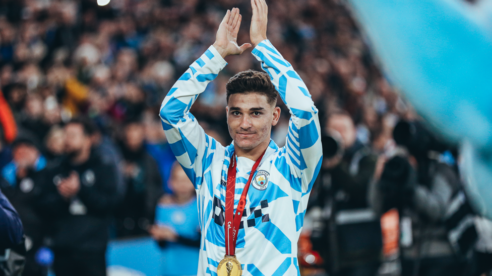 HERO’S WELCOME : Alvarez returns to the Etihad with the World Cup winners’ medal around his neck!