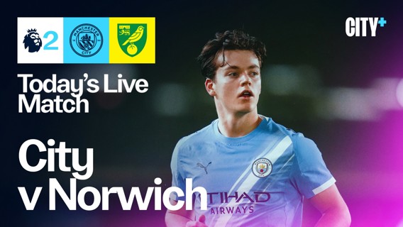Live match announcement for Manchester City vs Norwich with a blurred player in a Manchester City kit.