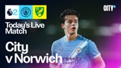 Live match announcement for Manchester City vs Norwich with a blurred player in a Manchester City kit.