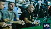 Coaching staff on the bench during Manchester City's Asia Tour '26, presented by Experience Abu Dhabi.