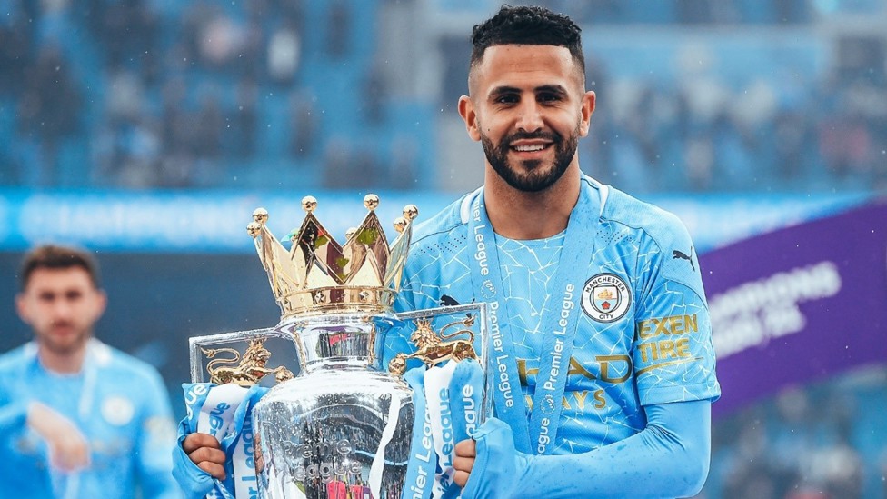 SMILE FOR THE CAMERA : Mahrez is pictured with the Premier League trophy following our triumph in the 2020/21 season. 