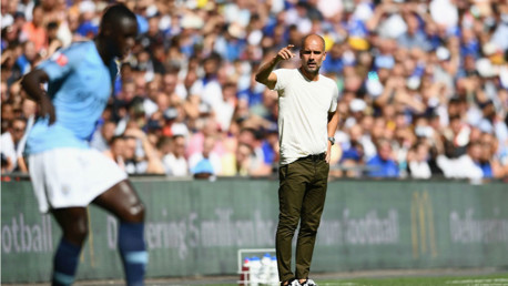 PEP TALK: City boss Pep Guardiola passes on instructions to Benjamin Mendy
