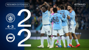 Image showing Manchester City players celebrating after a match against Brighton & Hove Albion. The score is tied 2-2, with Manchester City winning 4-3 in penalties.