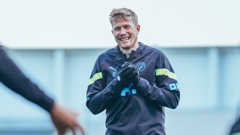 DE BRUYNE DELIGHT : Kevin De Bruyne shares a joke with his team-mates