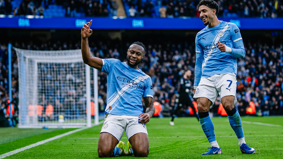 DEADLY DUO : The two goalscorers celebrate.