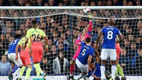 WONDER SAVE: Ederson pushes Mina's header over from point-blank range