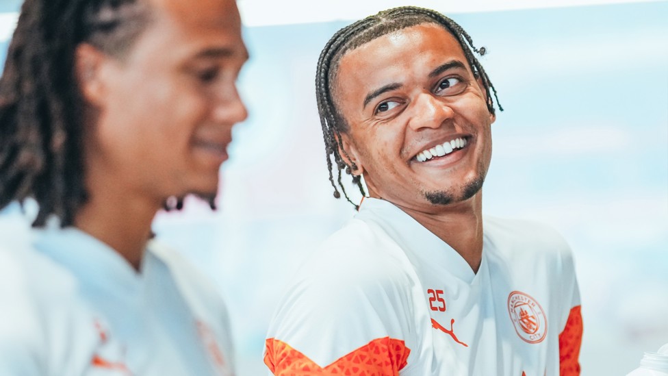 DEFENSIVE DUO : Manuel Akanji and Nathan Ake share a joke as they get on the bikes at the CFA