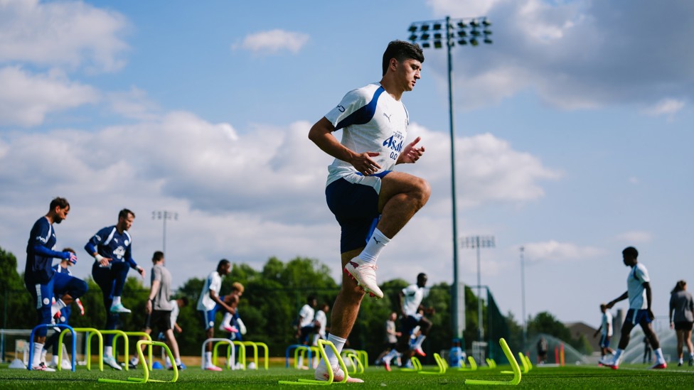 HURDLES : Abdukodir Khusanov limbers up.