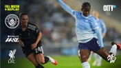 Manchester City women's team player in blue kicks the ball while a Liverpool player in black defends. WSL logos are present with full match replay information.