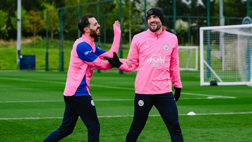 CLOSE QUARTERS : Bernardo and Kovacic share a joke