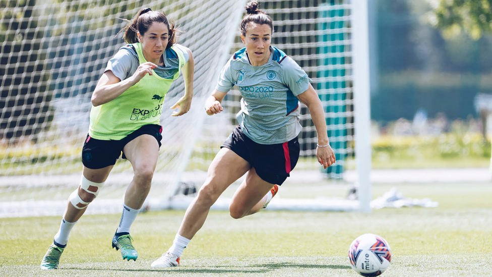 RACE IS ON : Vicky Losada and Lucy Bronze chase after the loose ball