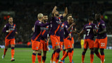 SQUAD: City celebrate after Mahrez bags his fifth goal for the club.