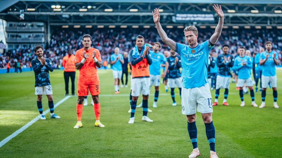 CLASS AT THE COTTAGE : KDB says a fond farewell to our away faithful after the vital 2-0 win at Fulham