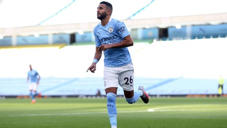 DREAM START: Mahrez celebrates blasting us ahead in the fourth minute.