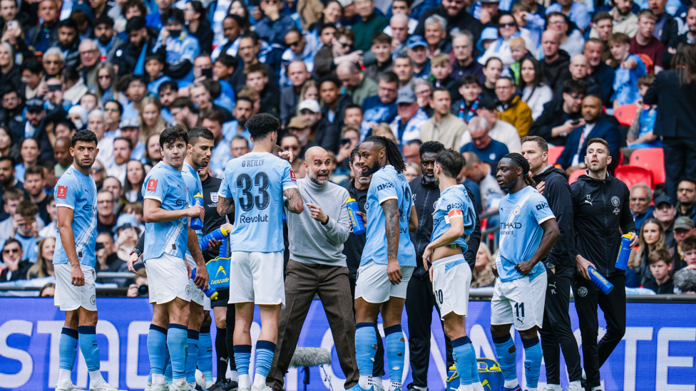PEP TALK : The boss passes on instructions.