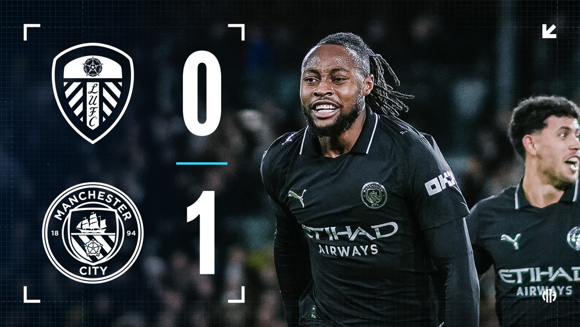 Scoreboard showing Leeds United vs Manchester City with a 0-1 result. Manchester City player celebrating.