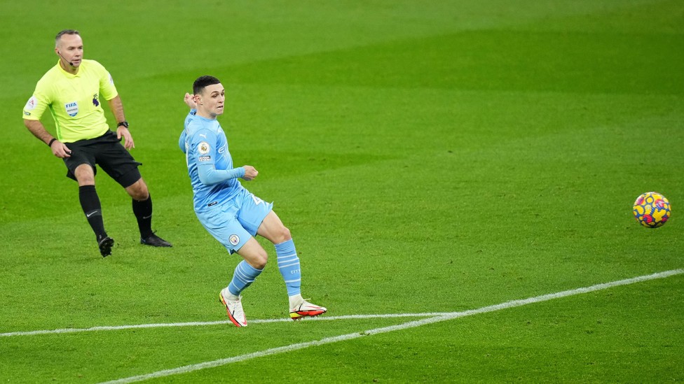 PERFECT START : Phil smashes the ball home with just seven minutes gone. 