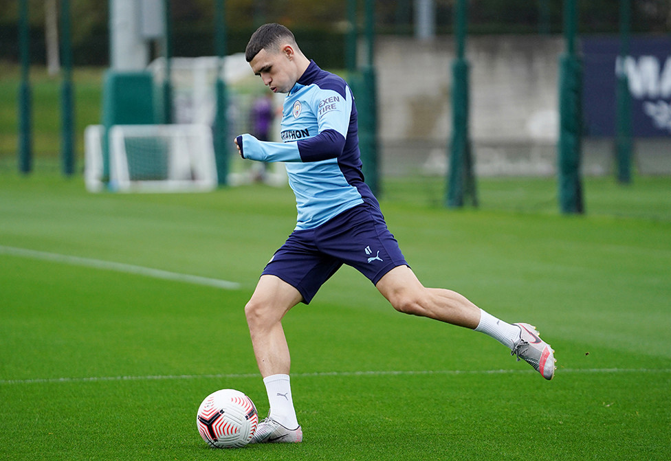 BY THE LEFT: Phil Foden pings in a left-footed cross