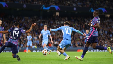 SUPER JACK: Grealish curls in on his UCL debut to make it 4-2.