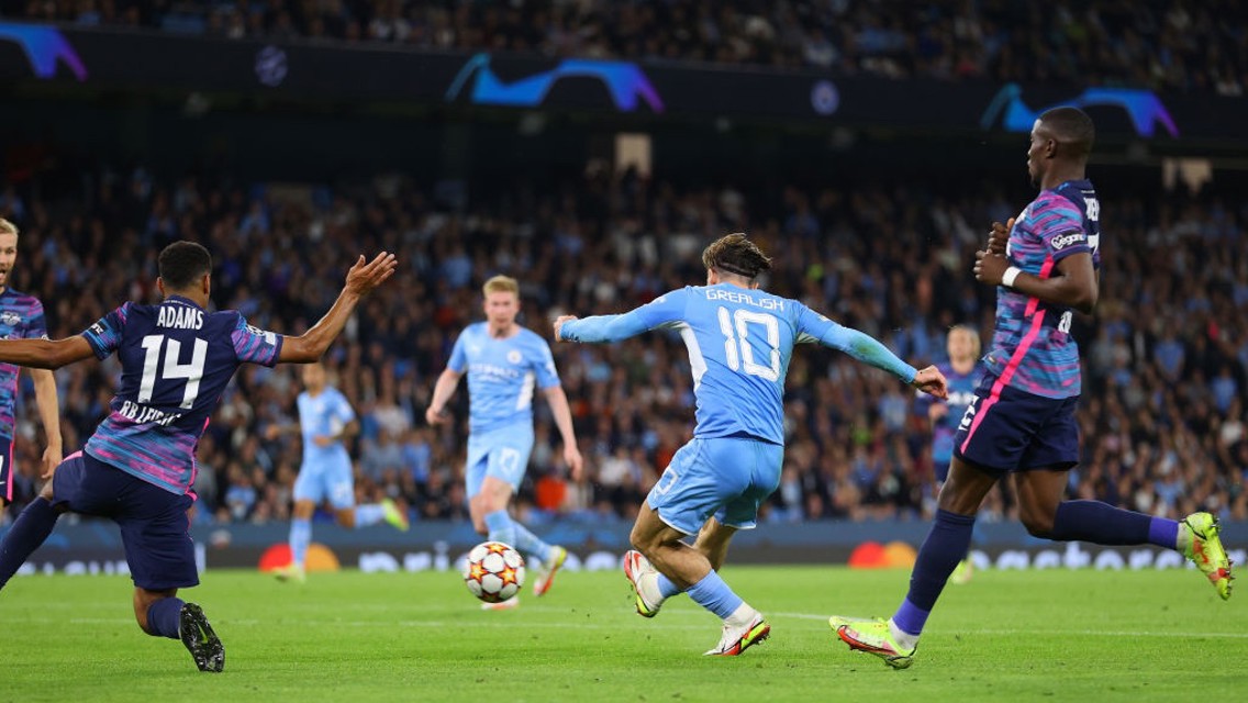 SUPER JACK: Grealish curls in on his UCL debut to make it 4-2.
