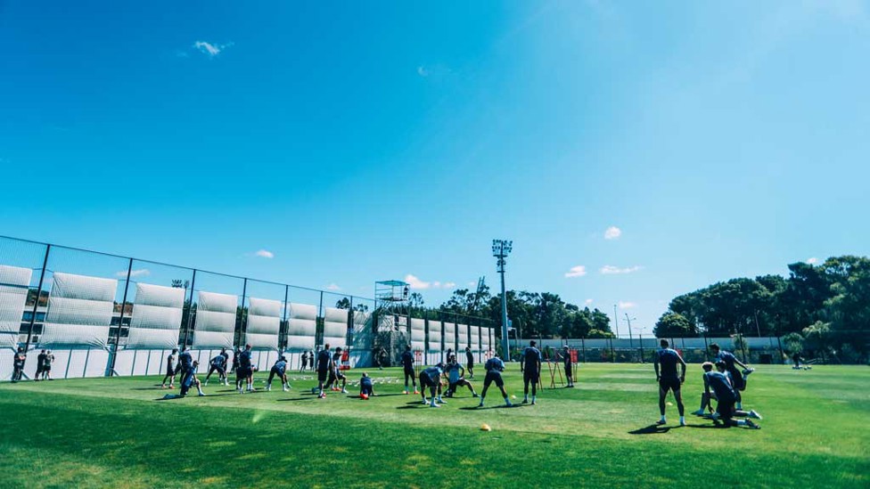 BLUE SKY THINKING: An eye-catching shot of the squad hard at work in Portugal