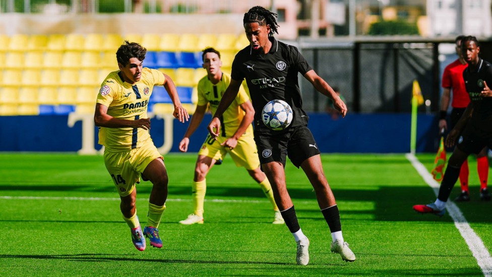 BOUNDING BRAITHWAITE : Kaden Braithwaite carries the ball forward as City look to attack.