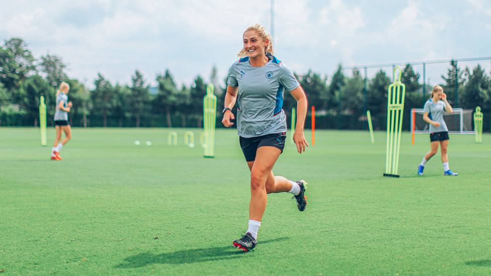 SUPER SEVEN : Laura Coombs has been dubbed an 'unsung hero' in the squad for her shining positivity