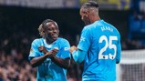 DYNAMIC DUO: Doku and Akanji celebrate.