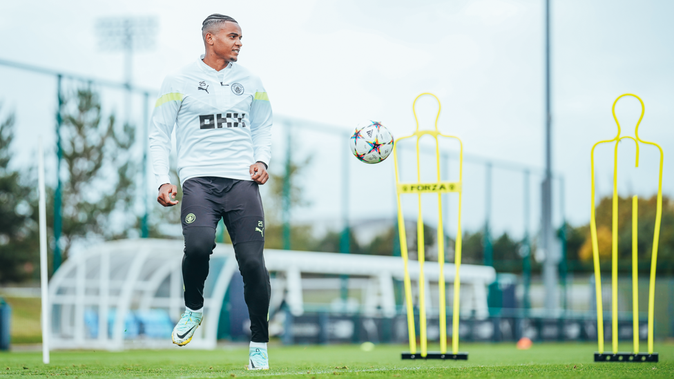 EYES ON THE BALL: Manuel Akanji gets ready to face his former side.