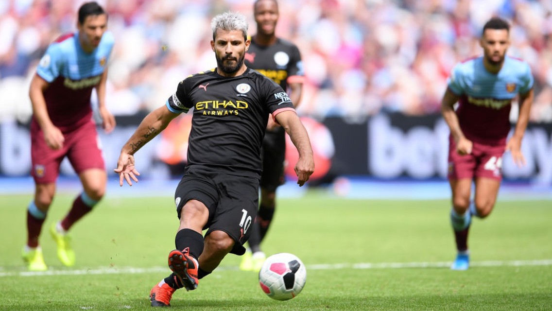 RESPONSIBILITY: Sergio Aguero scores with his second attempt from the penalty spot.