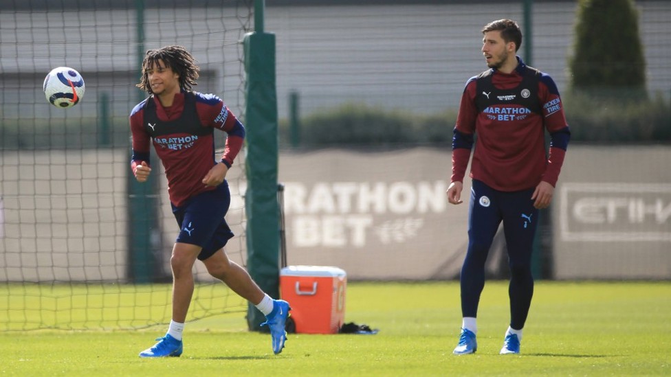 DEFENSIVE DUO: Nathan Ake and Ruben Dias warm up